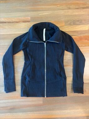 lululemon black zip jacket with cute quilted detail at waist and cuffs size 6